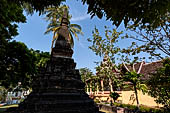 Vientiane, Laos - Wat Si Saket, the area around the temple precinct is filled with stupas, drum tower, open pavilion sheltering Buddha statues.